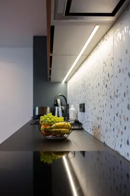 a bowl of fruit on a counter in a kitchen at M8 Stylish One-Bedroom Apartment in Kaunas