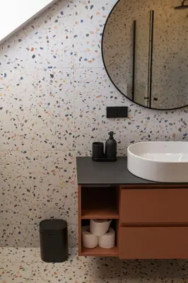 a bathroom with a sink and a mirror at M8 Stylish One-Bedroom Apartment in Kaunas