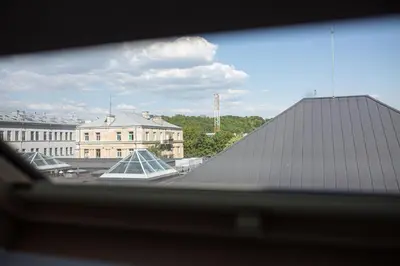 a view from a window of a building with a roof at M8 Stylish One-Bedroom Apartment in Kaunas