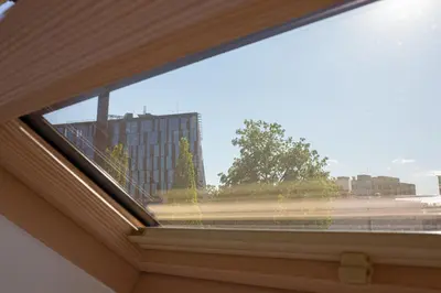 a window with a view of a street at M8 Modern Two-Floor Apartment in Kaunas