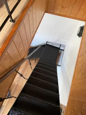 an overhead view of a staircase in a building at Namas senamiestyje in Kėdainiai