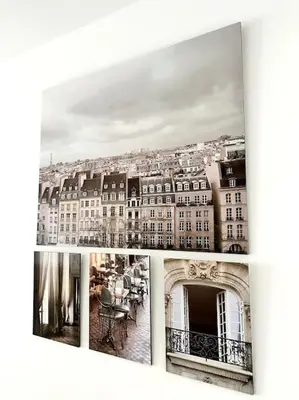a collage of photographs of a building at Wolfie Apartment, City Center in Vilnius