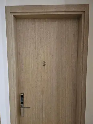 a close up of a wooden door at Kauno apartamentai king size bed in Kaunas