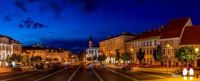 an empty city street at night with buildings at Panoramic Loft - Lollo Luxury in Vilnius