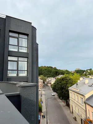 a view of a city street from a building at Kaunas apartments near Bus station in Kaunas