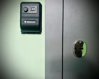 a close up of a metal refrigerator with a sign on it at Lovely Stay in Siauliai in Šiauliai