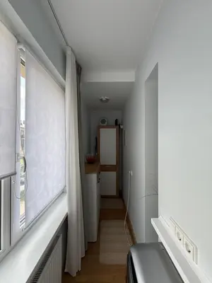 a bathroom with a shower and a sink in a room at Stilingi šaulio skulptūros apartamentai in Druskininkai