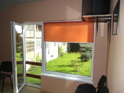 a window with a view of a yard at Nakvynė Rokiškyje in Rokiškis