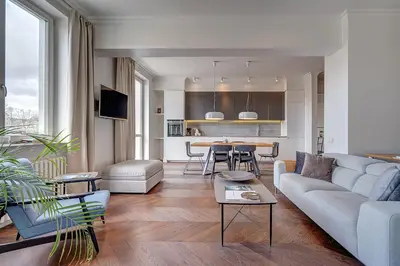 a living room with a couch and a table at Vilnius Apartments & Suites - Gedimino avenue in Vilnius