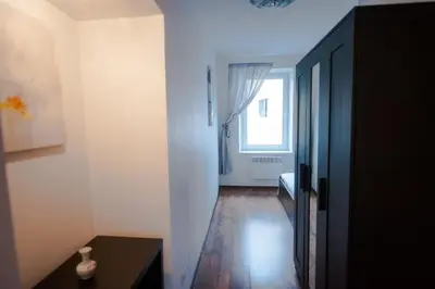 a room with a hallway with a window at V 18 - Superior & Great views to Vokieciu street in Vilnius