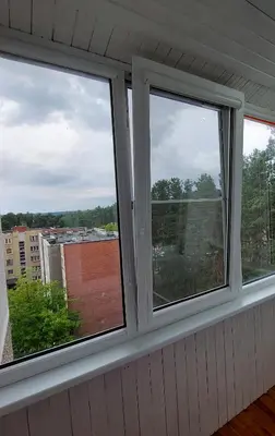two windows in a room with a view at Patogus poilsis prie ežero/Comfortable rest in Visaginas