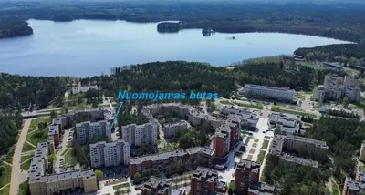 an aerial view of a city with a lake at Patogus poilsis prie ežero/Comfortable rest in Visaginas