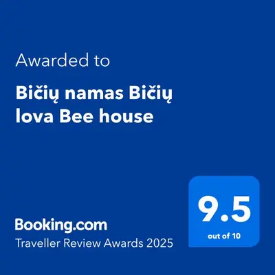 a screenshot of a phone with the text awarded to biffymans biliary at Bičių namas Bičių lova Bee house in Sargeliai