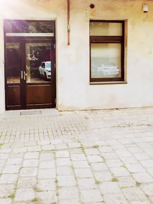 a building with a door and a window at Charming Apartment in Kaunas Old Town with Balcony in Kaunas