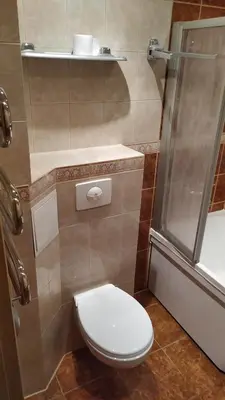 a bathroom with a toilet and a shower at Visaginas Taikos 84 in Visaginas