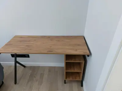 a desk in a room with a book shelf at Big Mama Koala in Druskininkai