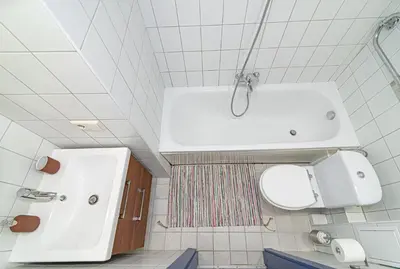 a bathroom with a sink and a toilet at Slow-down, relax, take it easy in artsy Oasy in Vilnius