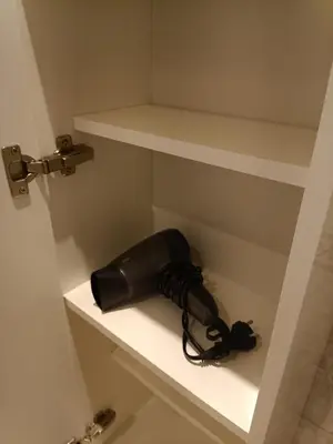 a camera is sitting on a shelf in a room at Welcome home Taikos 72V-22 in Visaginas