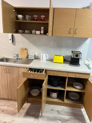 a kitchen with a sink and a counter top at Naisiai-2 in Naisiai