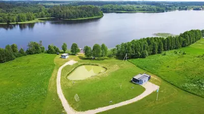 an aerial view of an island in a lake at Sodyba Svayos in Zarasai