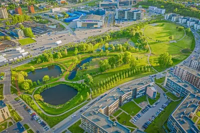an aerial view of a park with trees and buildings at The cosiest apartment in Vilnius in Vilnius