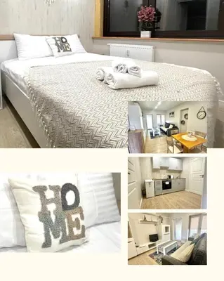 a collage of pictures of a bedroom with a bed at Kaunas Stay Apartment in Kaunas