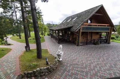 a building with a statue of a rabbit in front of it at Liūto kalnas in Trakai