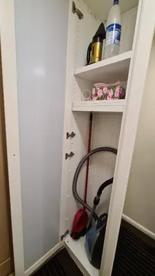 a cabinet with a vacuum cleaner in it at near the old town in Kaunas