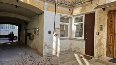 an entrance to a building with a door and windows at Zema5 Old Town Loft in Vilnius