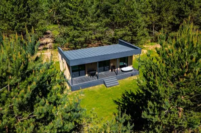 an overhead view of a house in the woods at Chill Hill Kalviai in Kalviai