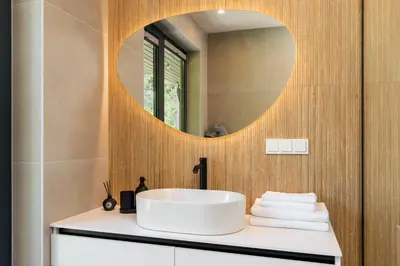 a bathroom with a sink and a mirror at Chill Hill Kalviai in Kalviai