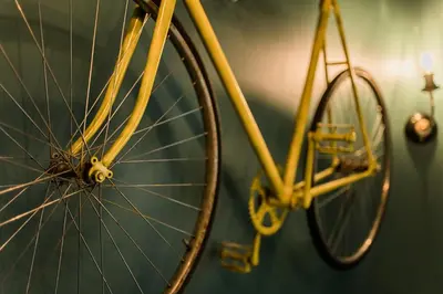 a close up of a bike tire on a wall at Quiet and Cosy apartment in Kaunas Old Town in Kaunas