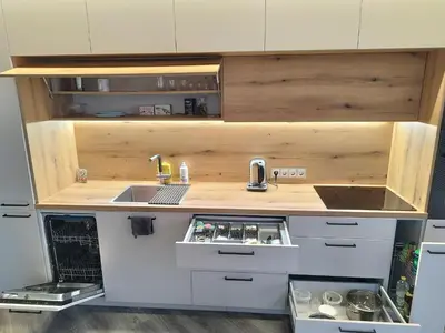 a small kitchen with a sink and a counter at Cozy Apartment Vilnius in Vilnius