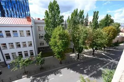 an overhead view of a city street with trees at Studio Apartment in Kaunas