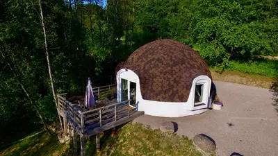 an overhead view of a round building with a roof at Kupolinis namelis in Kilova II