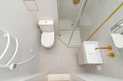 a bathroom with a toilet and a sink at #stayhere - Authentic & Artsy Studio in Heart of Vilnius Old Town in Vilnius