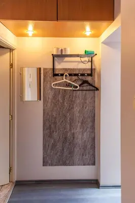 a room with a wall with a shelf on it at Vilnius Centre Flat in Vilnius