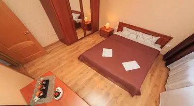 an overhead view of a bedroom with a bed at Musninkų apartment near Akropolis in Vilnius