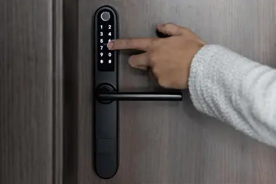 a person holding a door handle with their hand at AN Hotel self check-in in Šiauliai