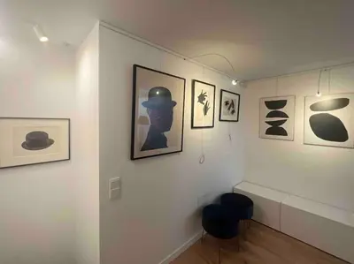 a room with pictures on the walls of a museum at KAUNAS ATTIC, Apartment in the heart of Kaunas in Kaunas