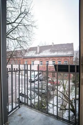 a view of a building from a balcony at Oldtown art apartaments in Kaunas
