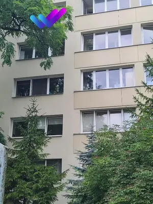 a building with a frisbee in front of it at Center 04 in Kaunas