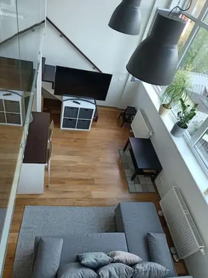 an overhead view of a living room with a couch at River Vilnele View Studio in Vilnius
