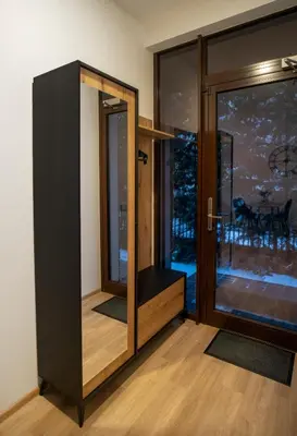 a room with a sliding glass door with a balcony at Central Station Apartment No2 in Kaunas