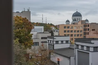 a view of a city skyline with buildings at Apt-Gallery in Central Kaunas in Kaunas