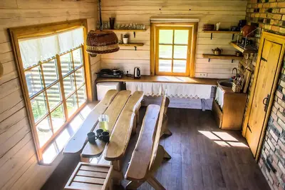 an overhead view of a kitchen in a log cabin at Barškulių Sodyba in Ricieliai