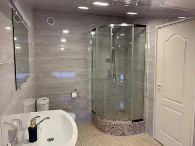 a bathroom with a shower and a sink at Saldus sapnas in Rokiškis