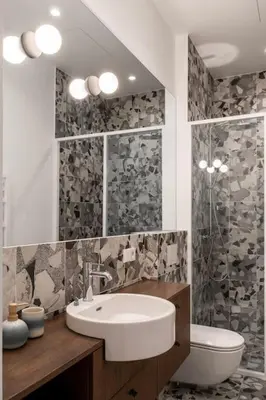 a bathroom with a sink and a toilet at Downtown getaway apartments by Prime Rentals I in Kaunas