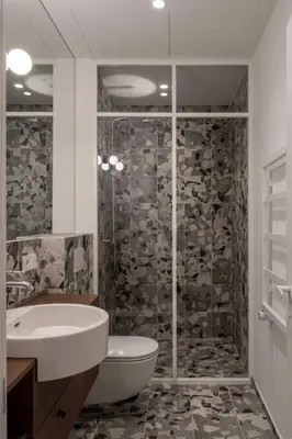 a bathroom with a shower and a toilet and a sink at Downtown getaway apartments by Prime Rentals IV in Kaunas