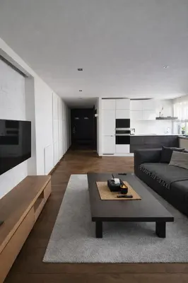 a living room with a couch and a coffee table at Downtown Boulevard View Residence in Šiauliai